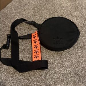 Adidas Round Black Bag with Vibrant Orange Strap